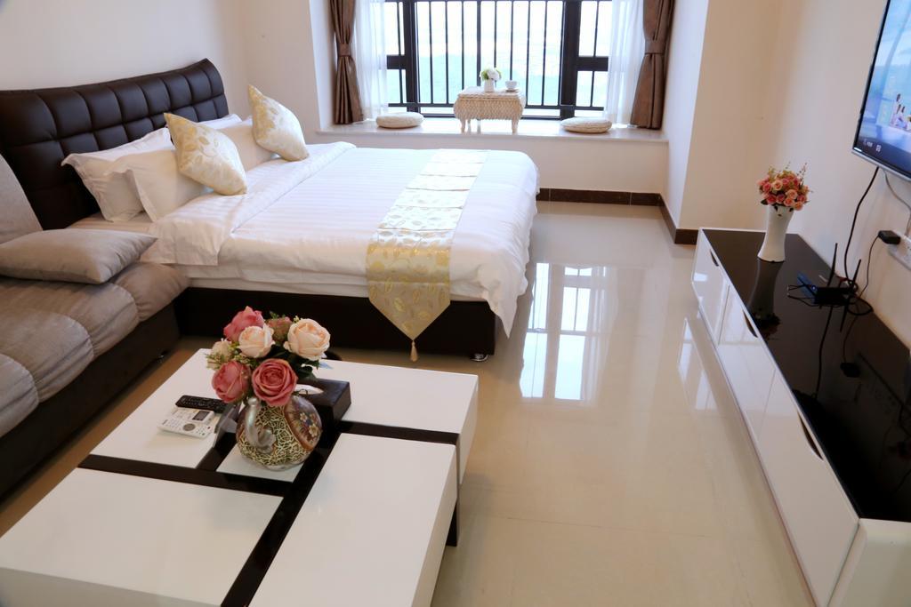 Guangzhou Yi Long International Apartment Rum bild