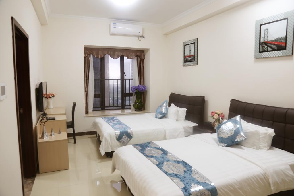 Guangzhou Yi Long International Apartment Rum bild