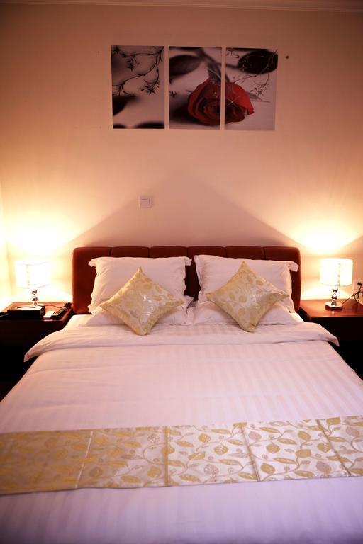 Guangzhou Yi Long International Apartment Rum bild